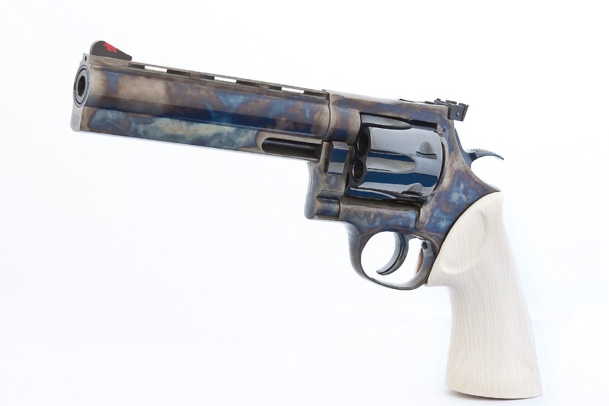 A gun that is painted blue and white.