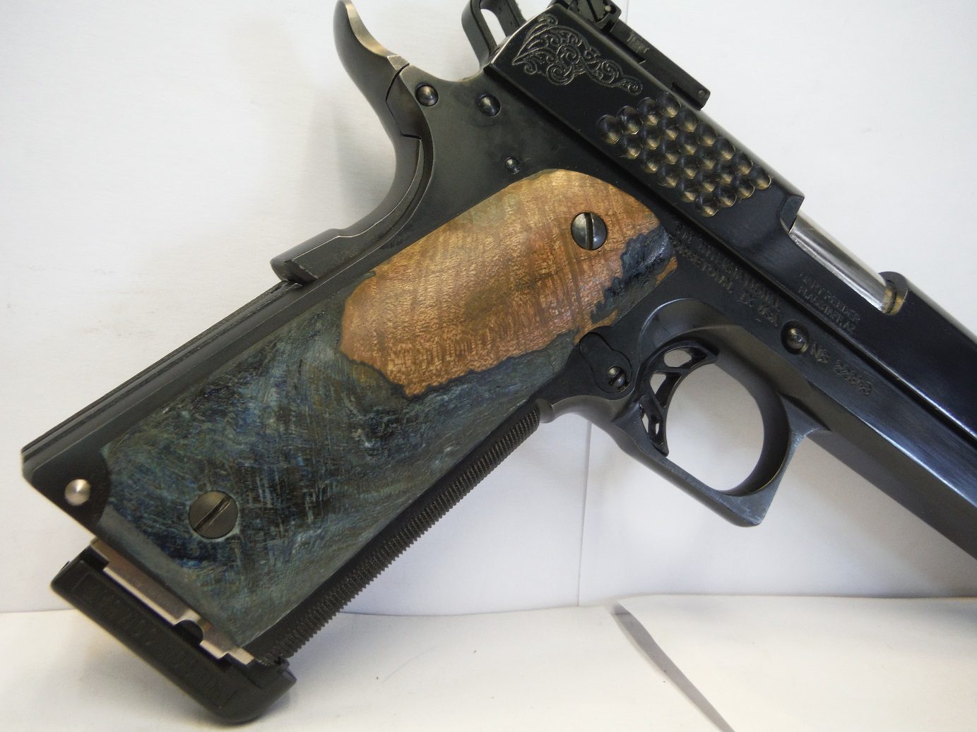 A gun that is sitting on top of the floor.