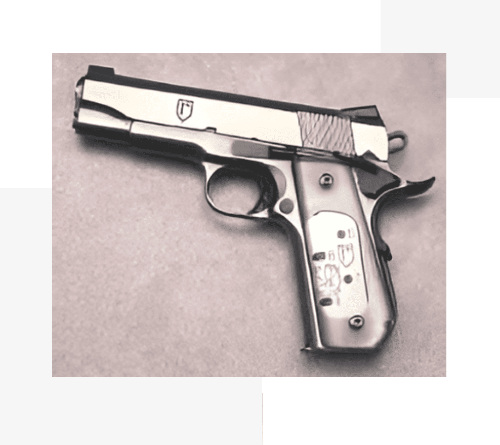 A close up of a gun on the ground