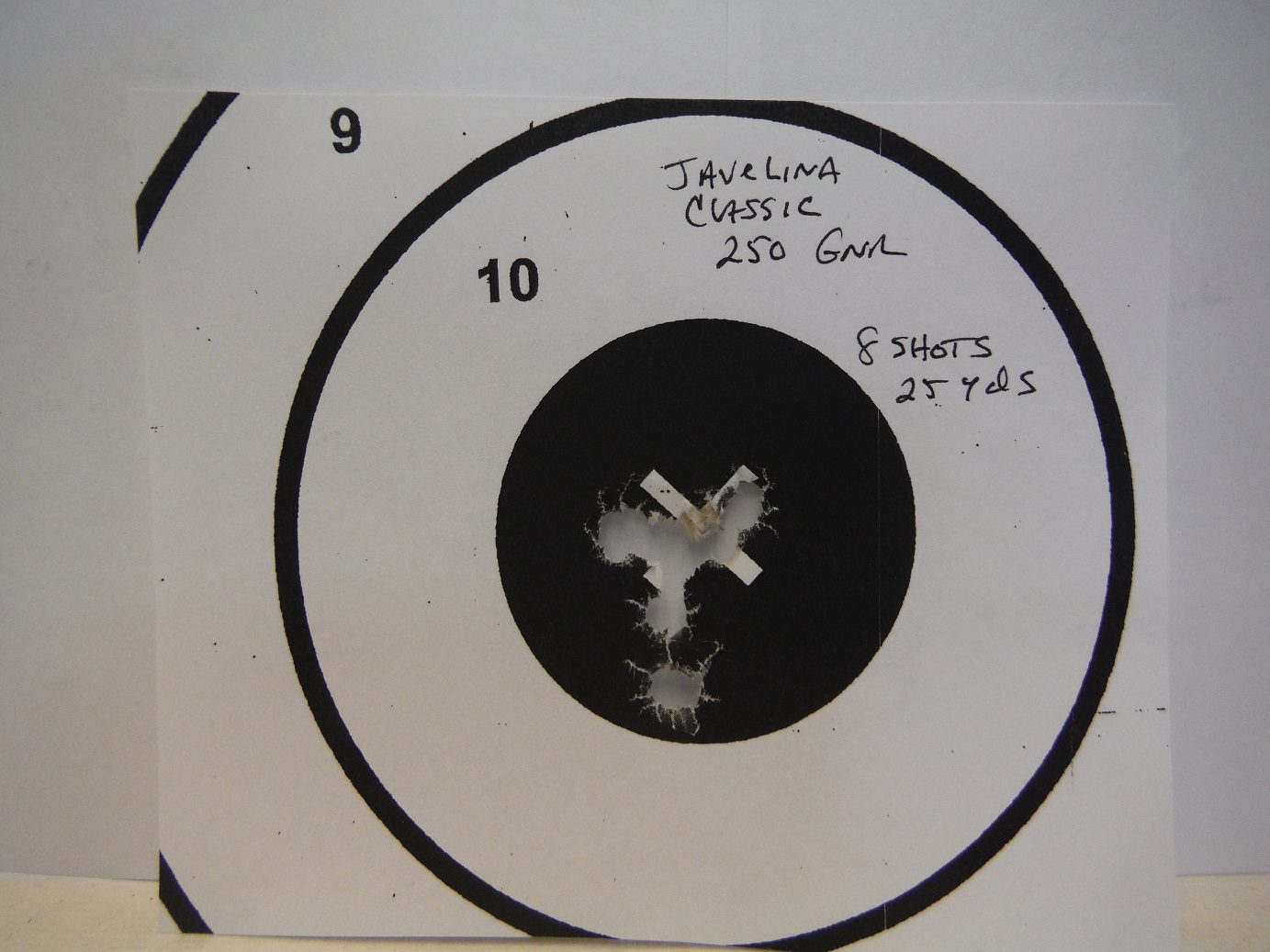 A close up of the back side of an old record