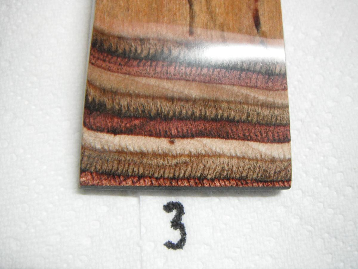 A number three is on the side of a wall.