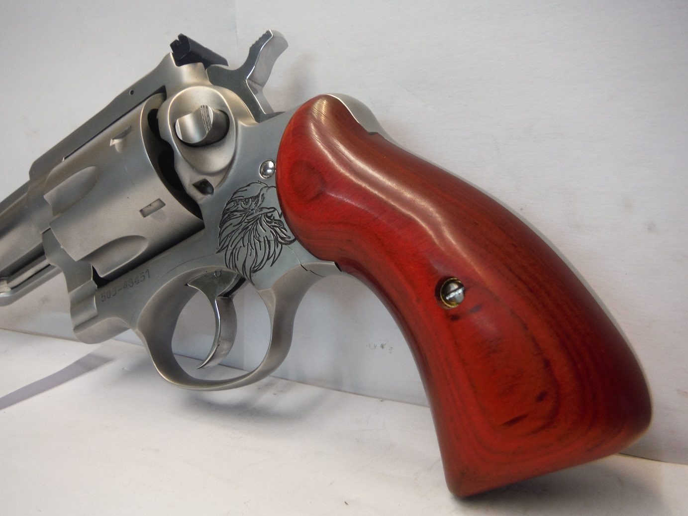 A gun that is laying on the ground