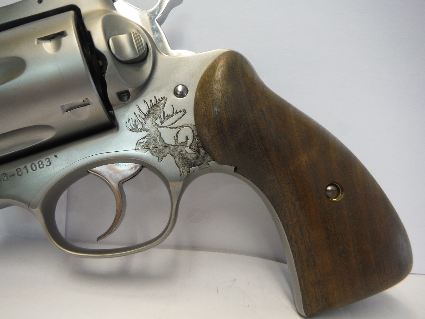 A close up of the side of a gun