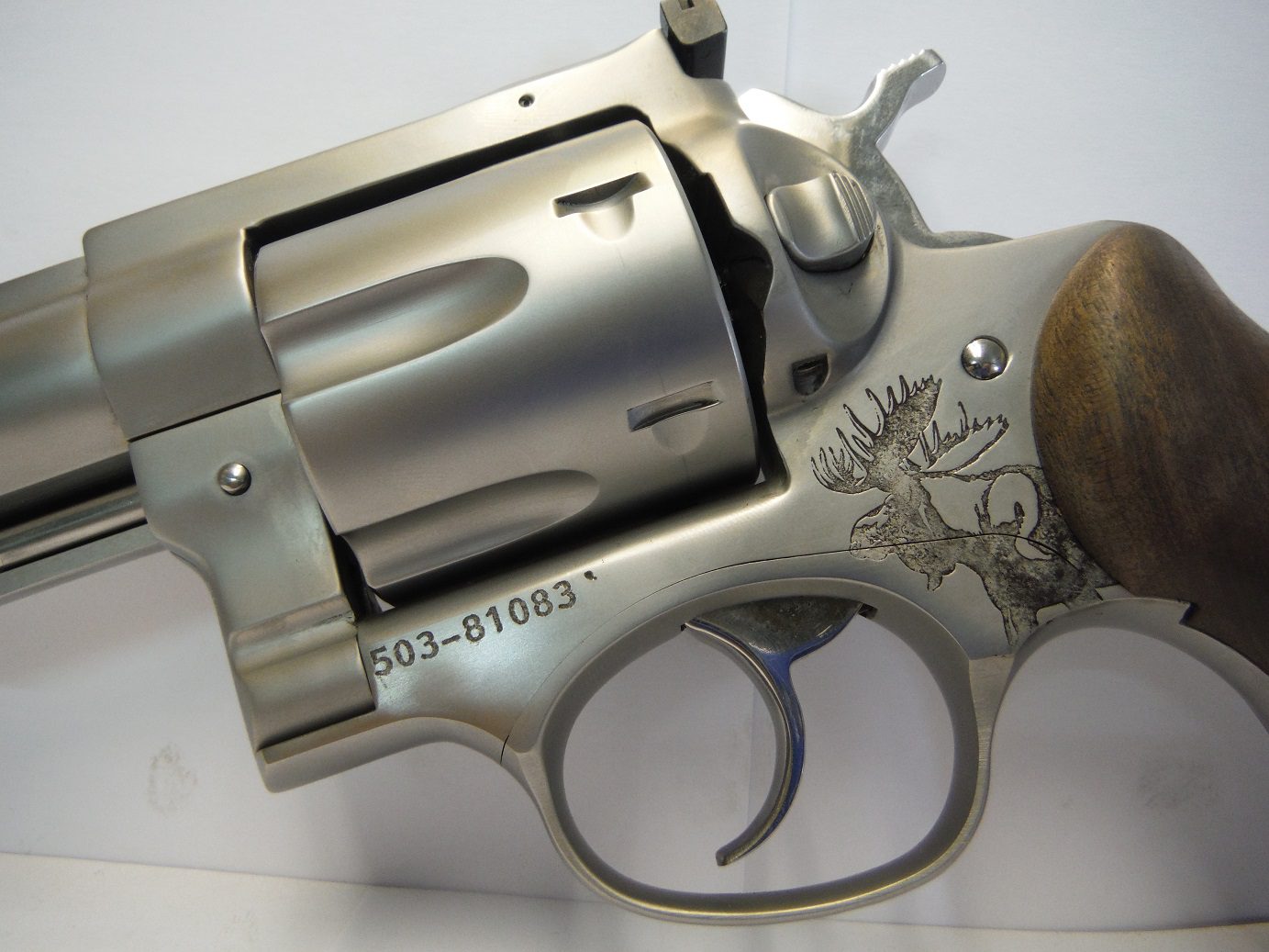 A close up of the side of a gun