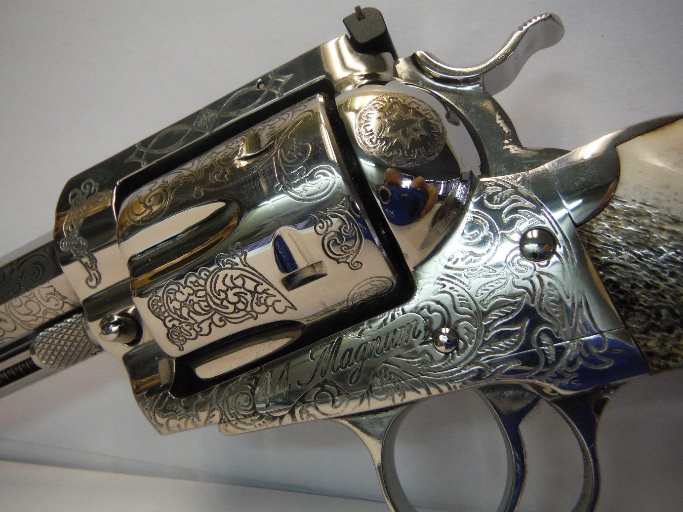 A close up of the side of an old gun