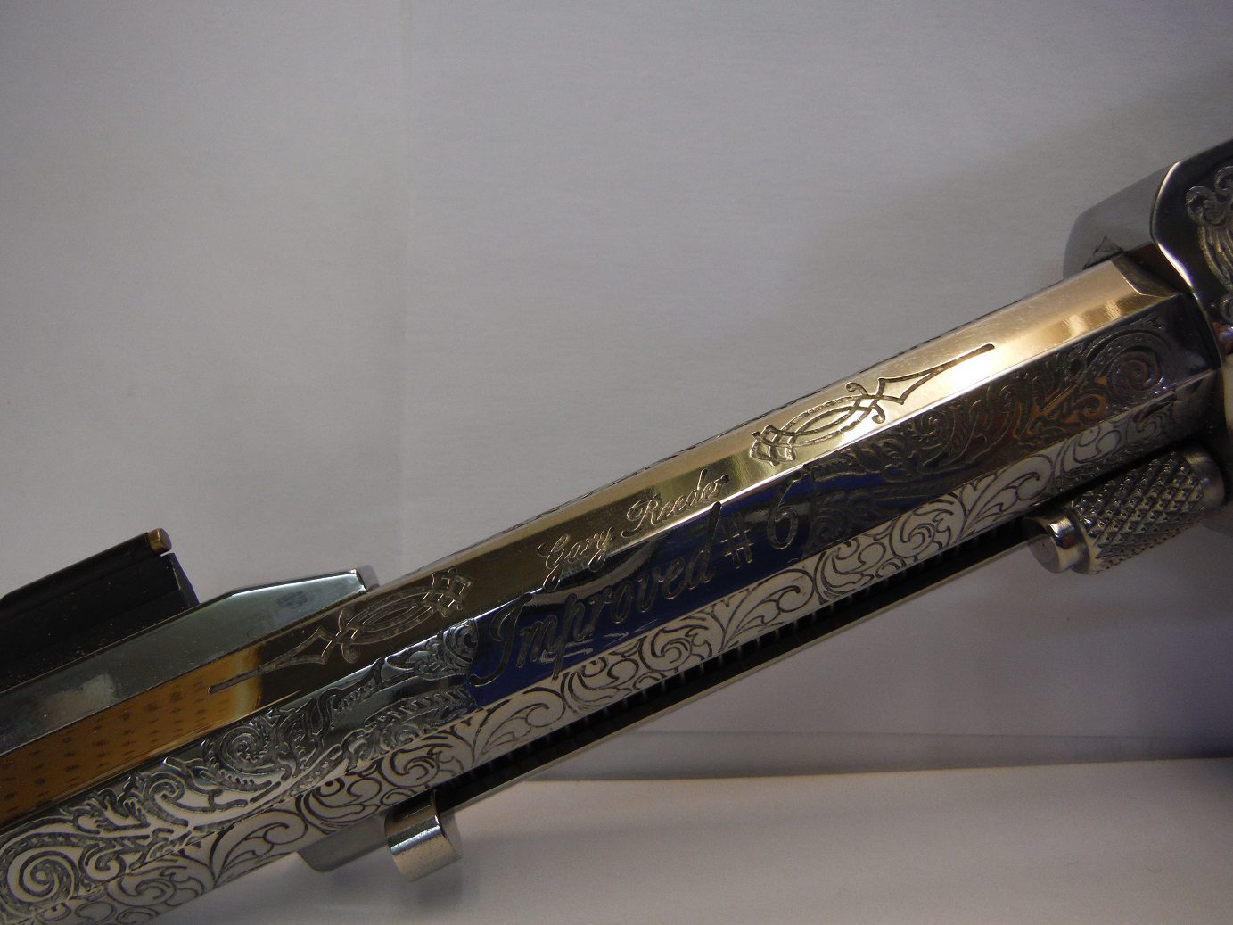 A close up of the side of a gun