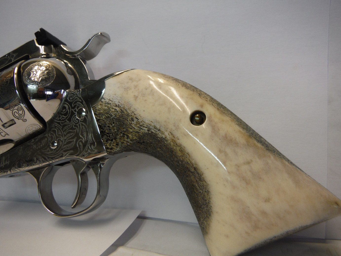 A close up of the side of an old gun