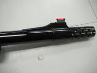 610-3 - Copy - Copy_small A close up of the sight on a rifle