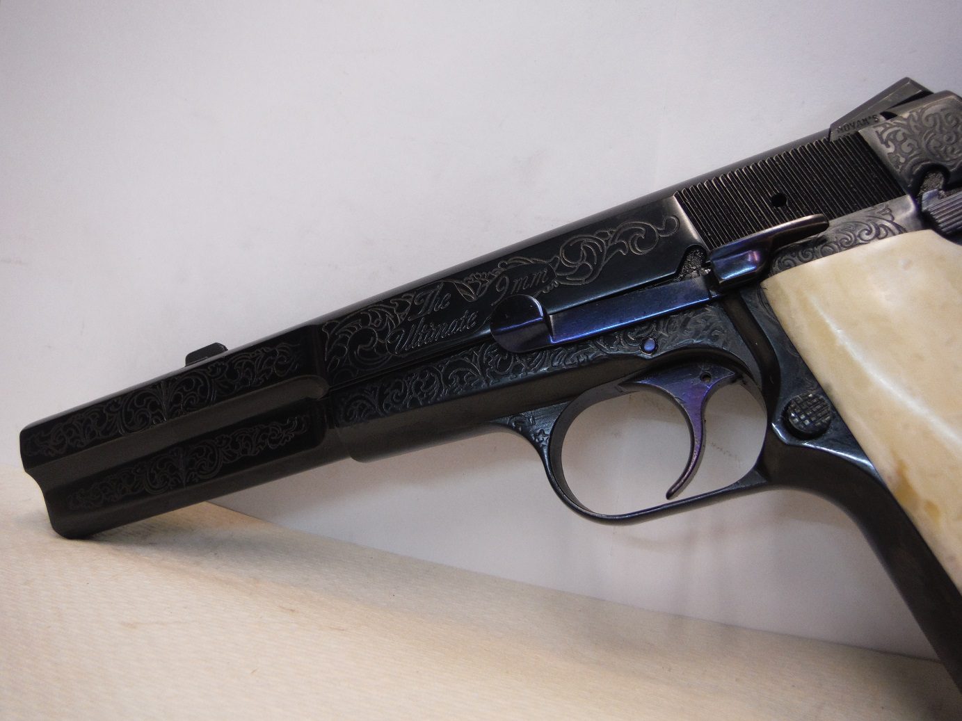 A close up of the side of a gun