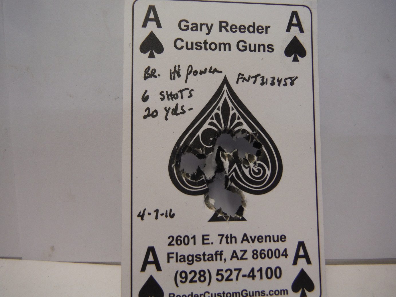 A card with the ace of spades on it.