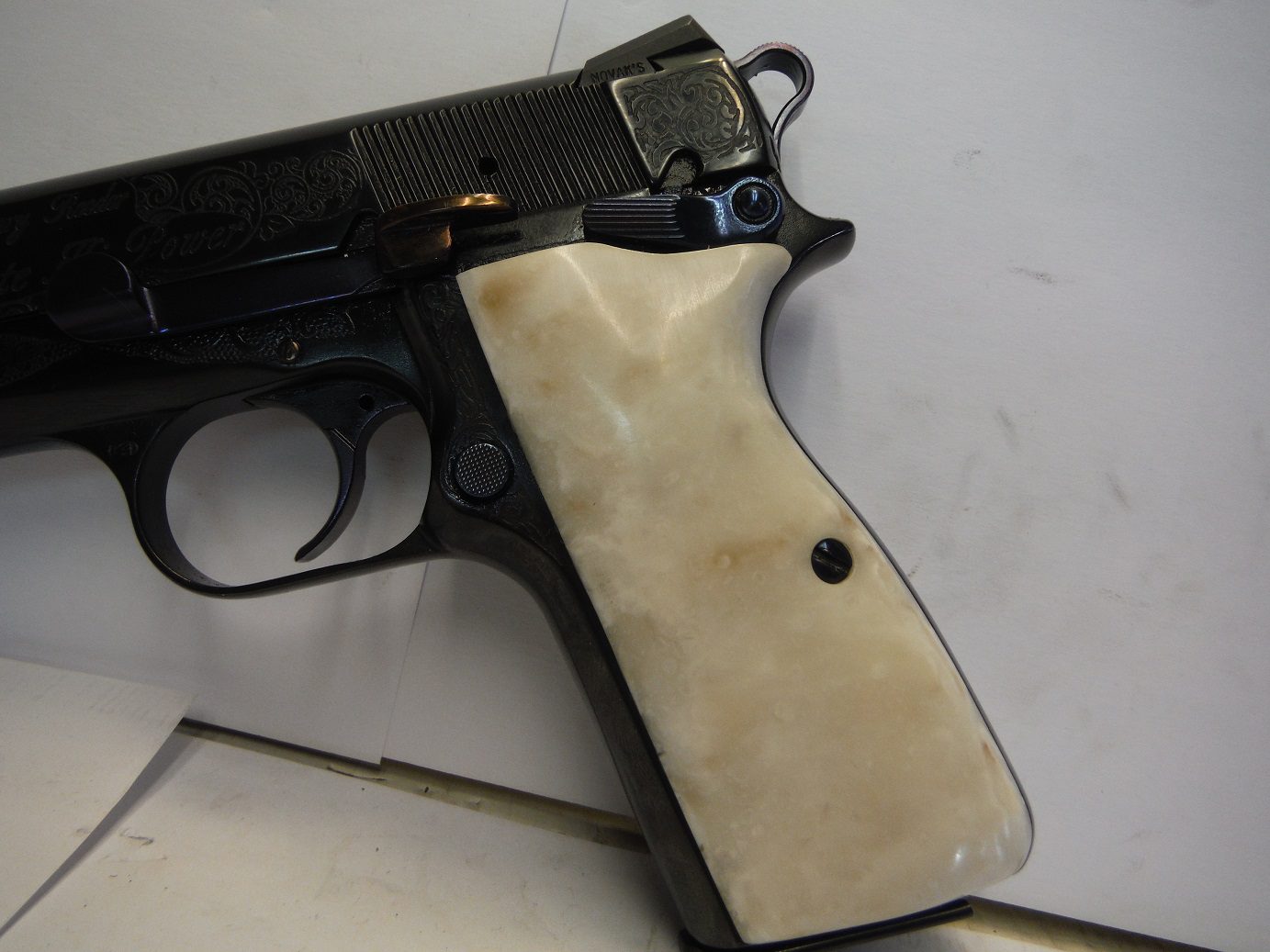 A gun that is sitting on the floor.