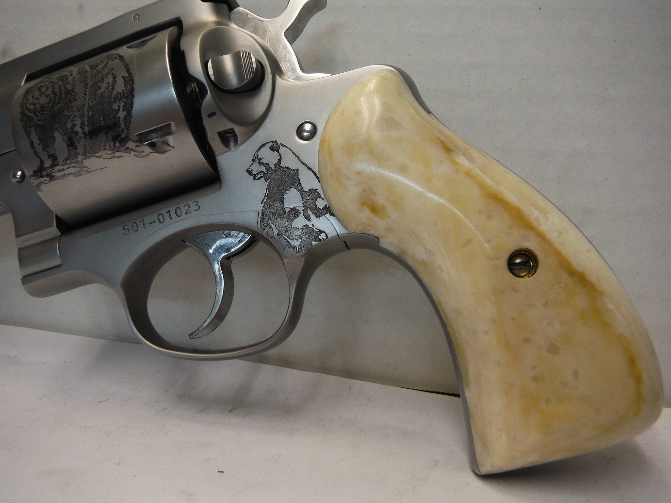A close up of the side of a gun