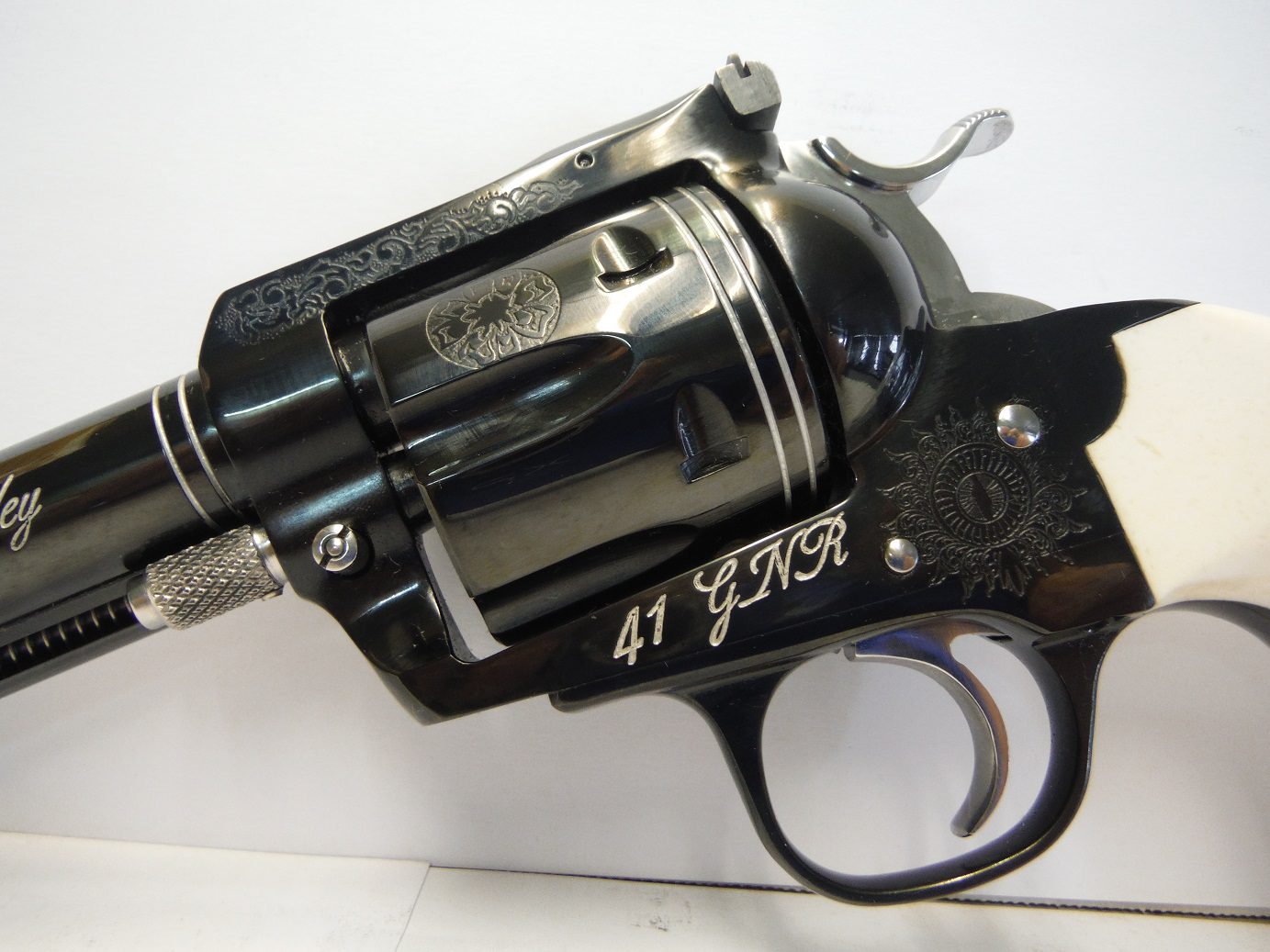 A black and silver gun with the words " 4 1 year ".