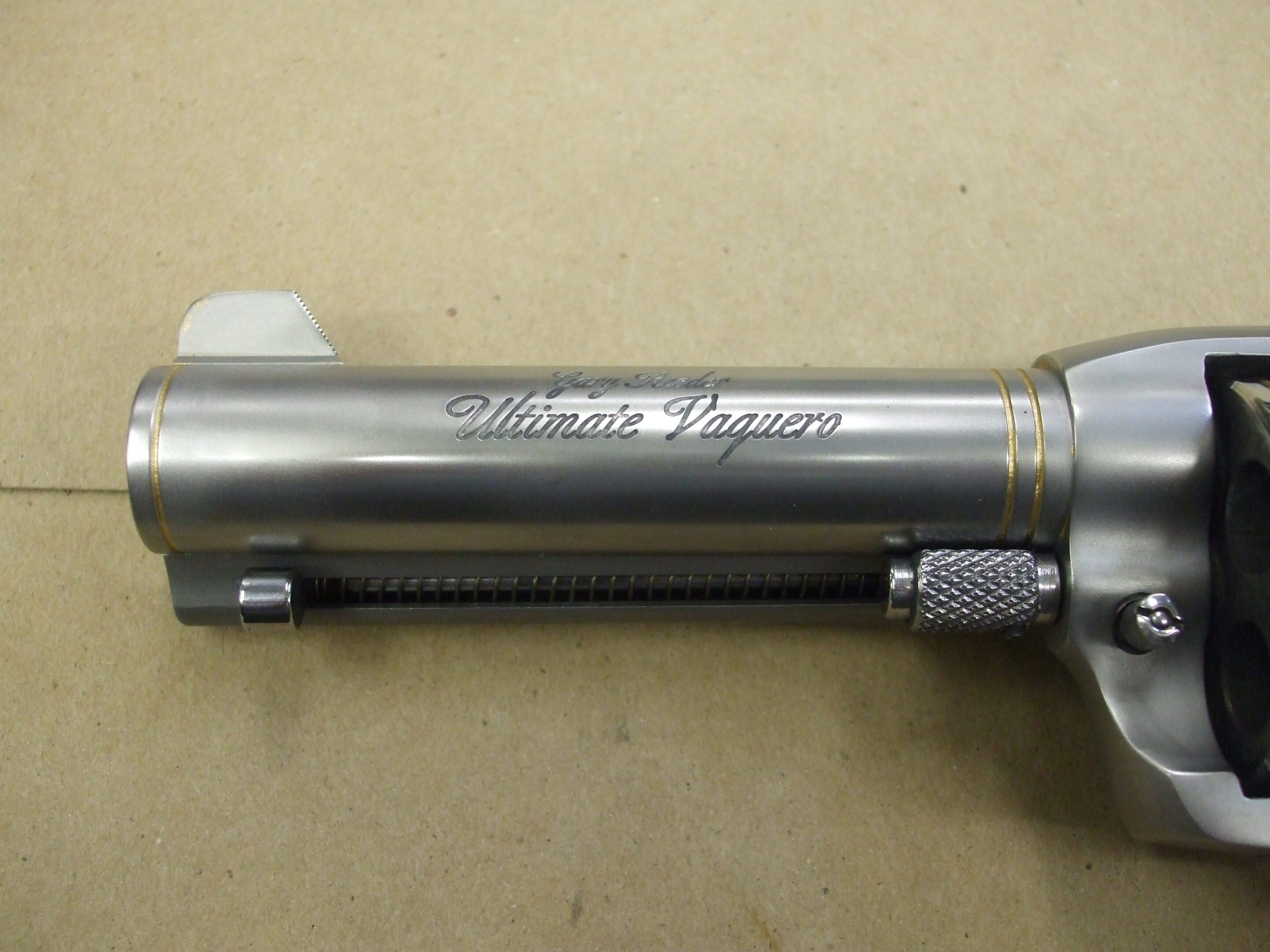 A close up of the side of a gun