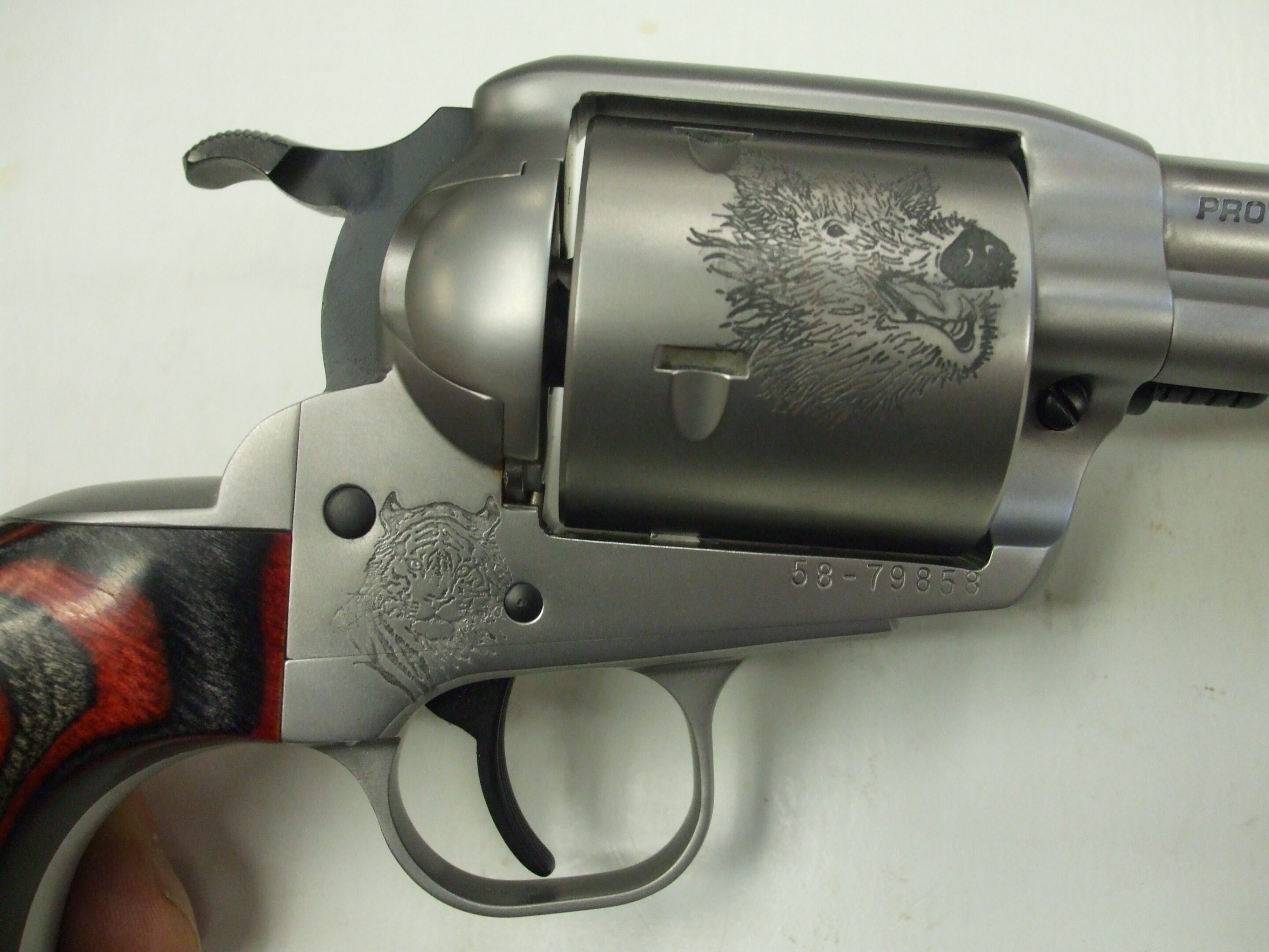 A close up of the side of a gun