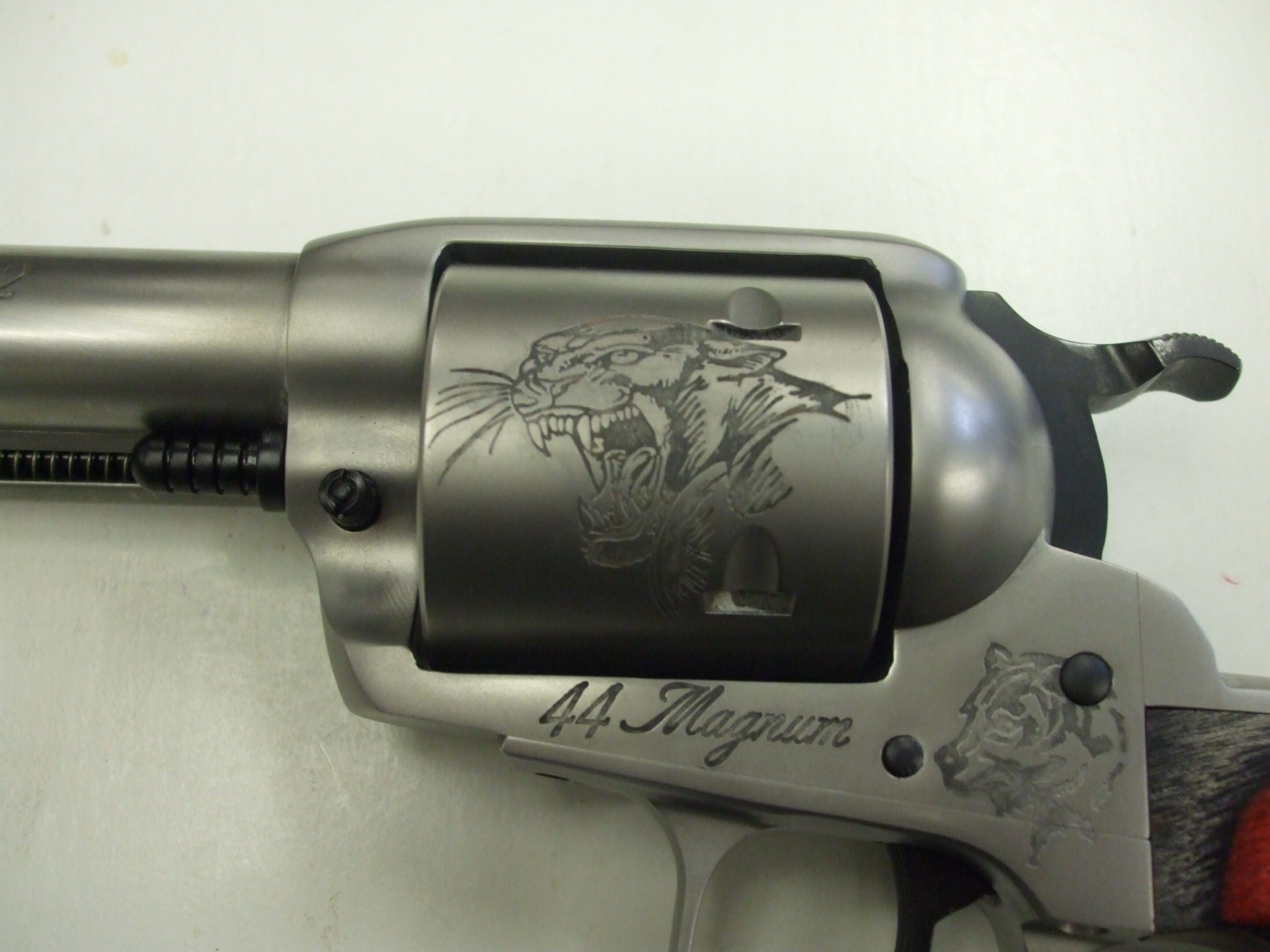 A close up of the side of a gun