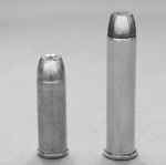Gary_b_small A bullet and a shell are shown side by side.