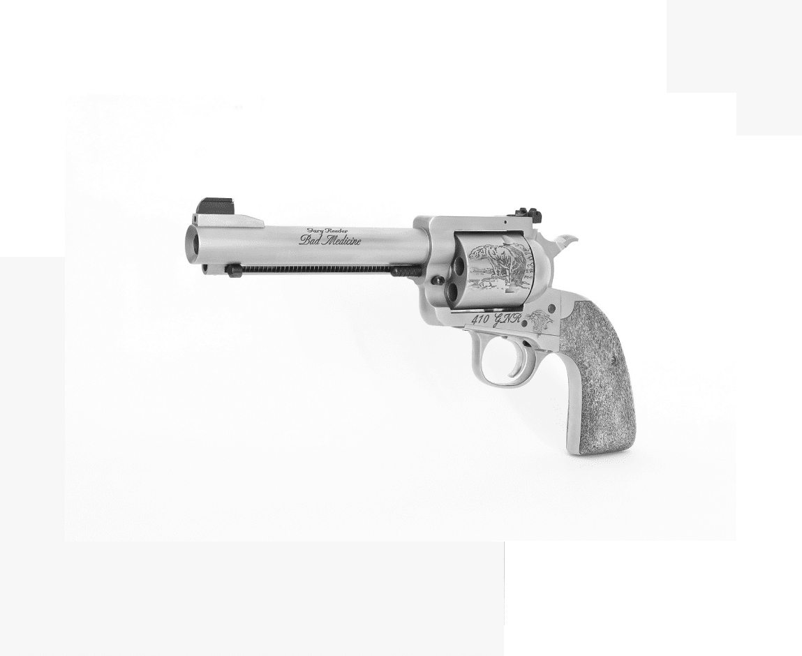 Group 19 A gun that is sitting on top of a table.