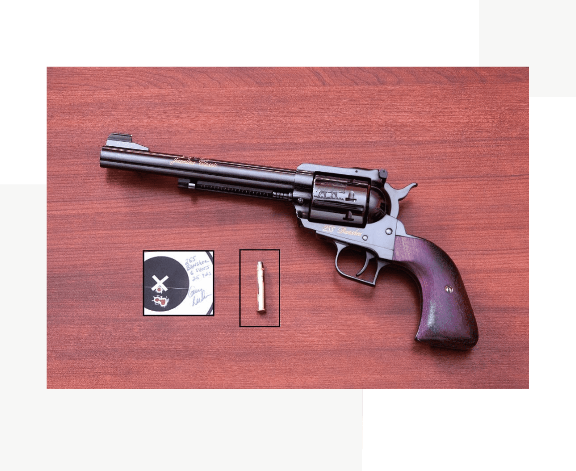 Group 39 A gun that is on top of a table.