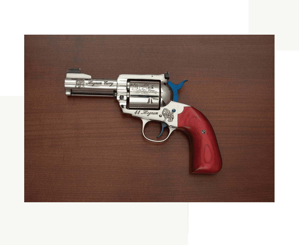 Group 41 A gun with a bird on the handle