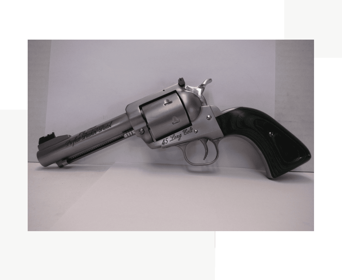 Group 49 A silver gun with black handle and a green background
