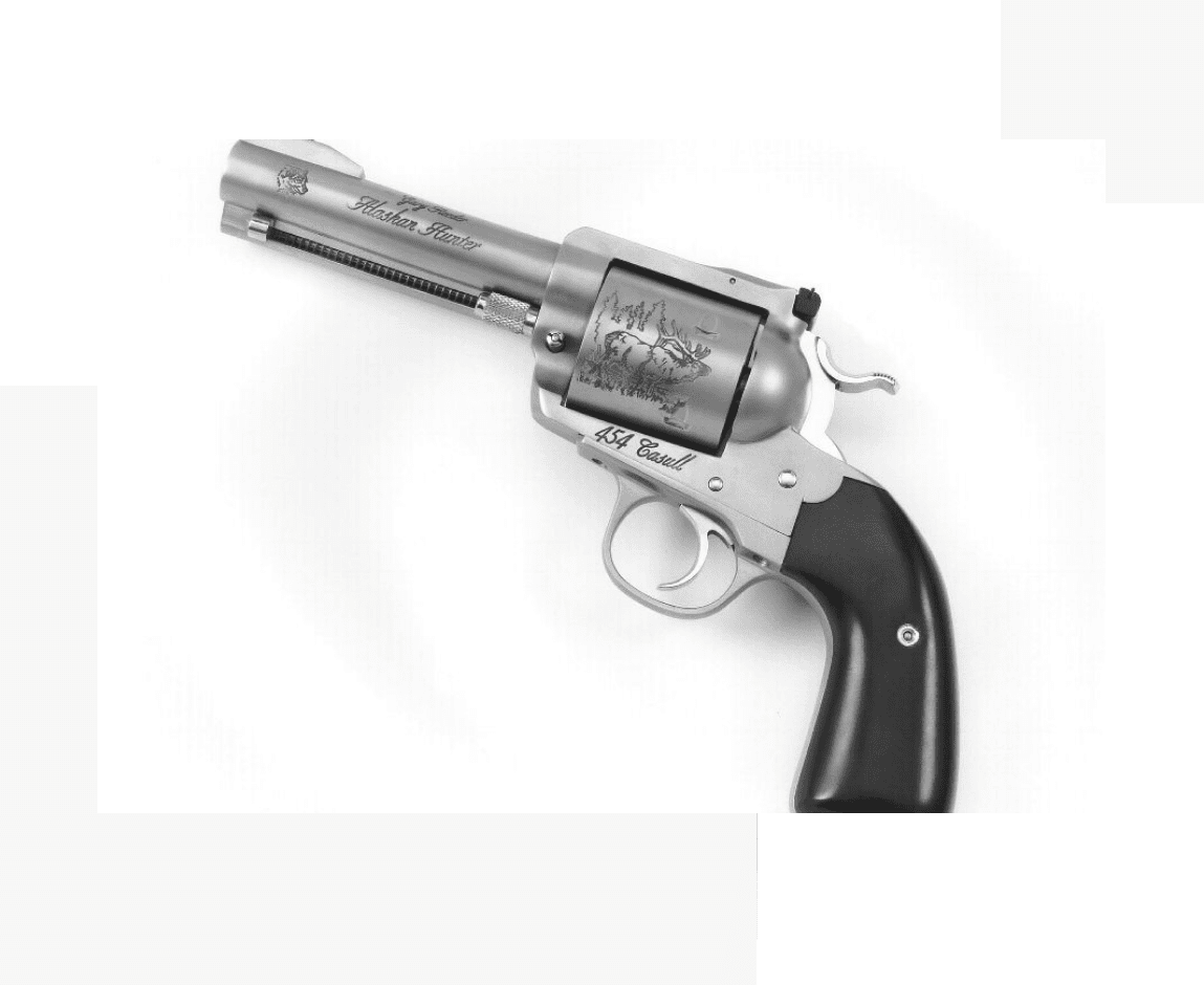 Group 60 A gun that is on the ground with its handle up.