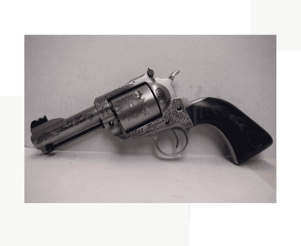 Group 64 A gun that is sitting on the ground.