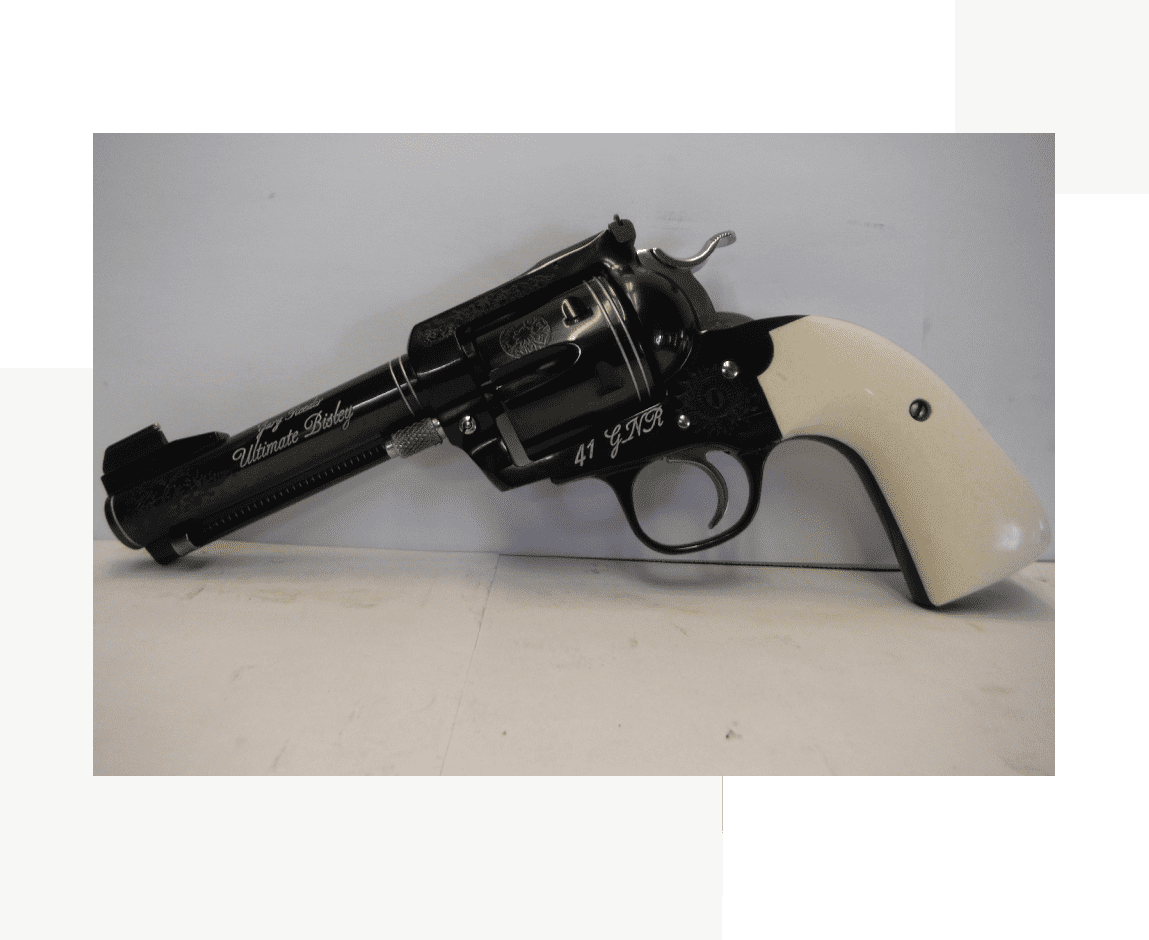 Group 65 A black and white gun is on the ground