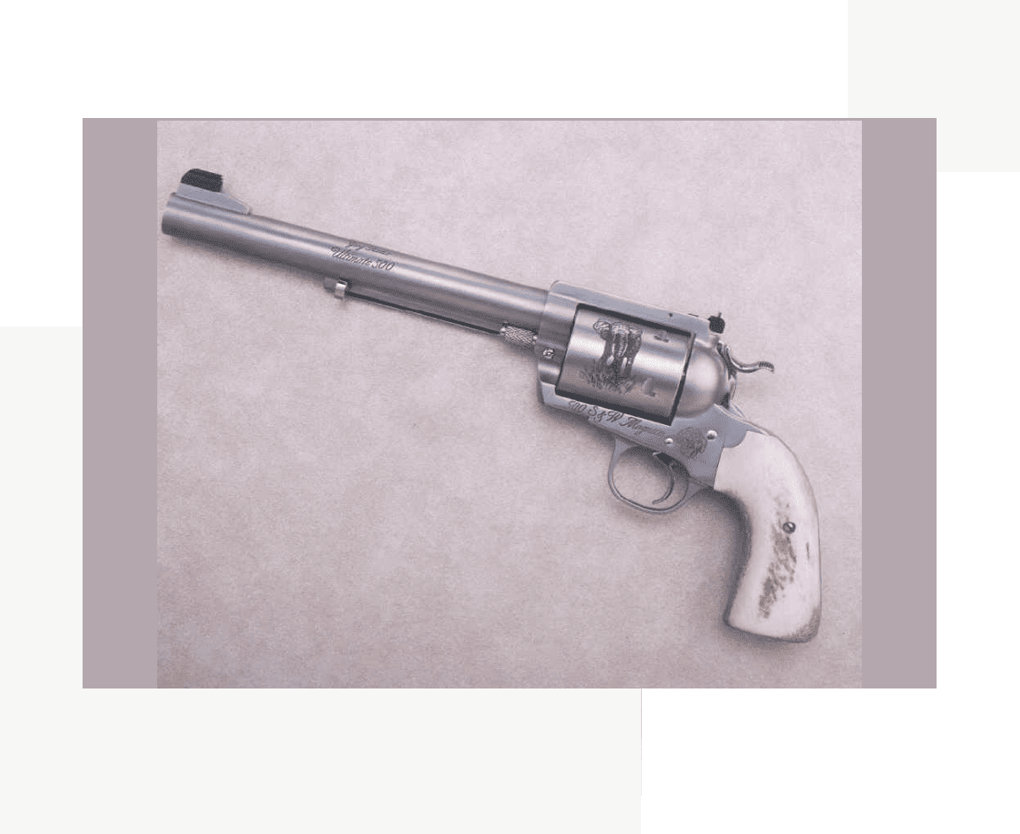 Group 72 A gun with a white handle and a picture of a person on the side.