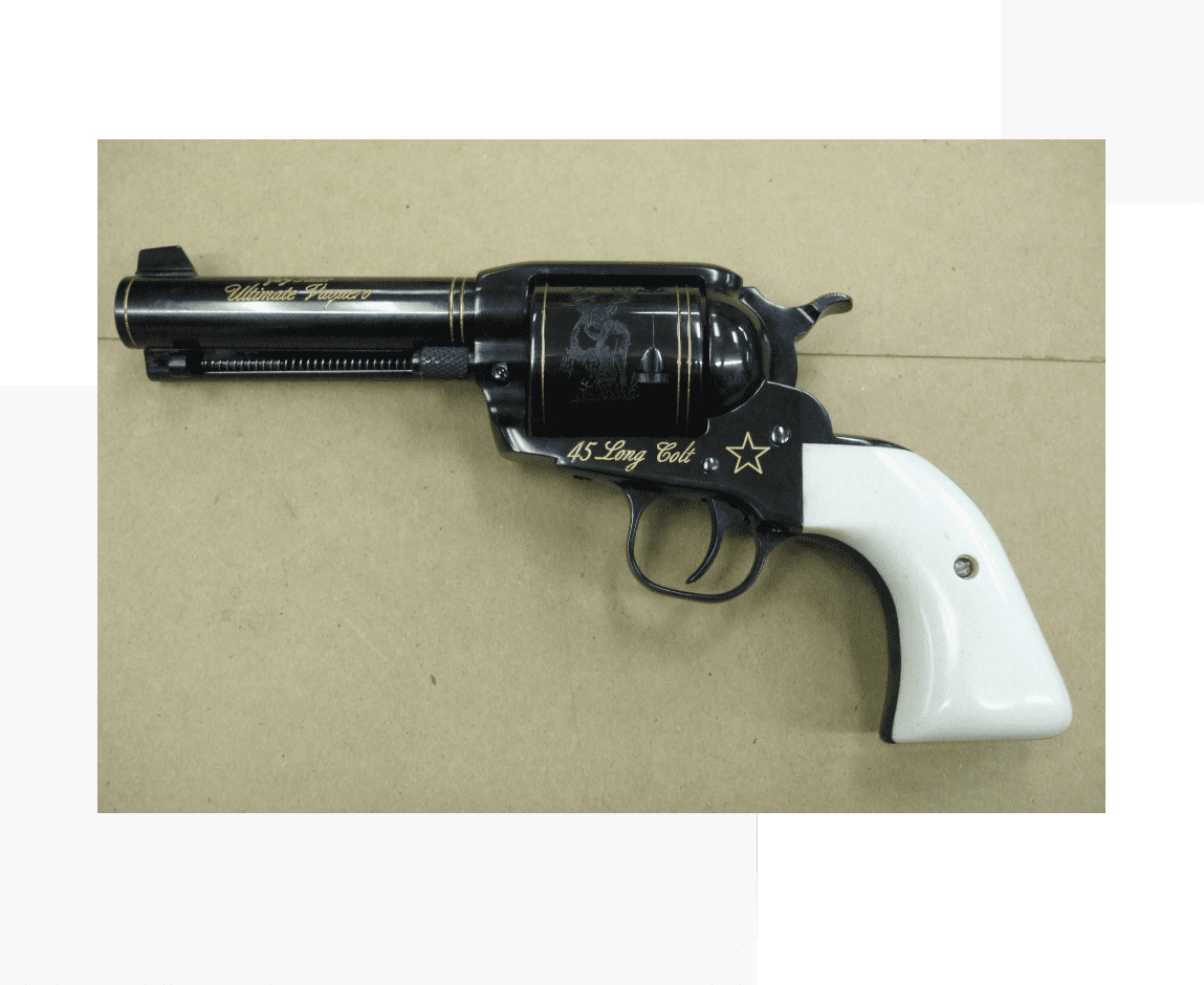 Group 74 A black and white gun with stars on it