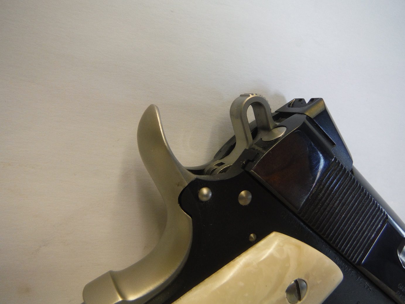 A gun that is laying on the ground