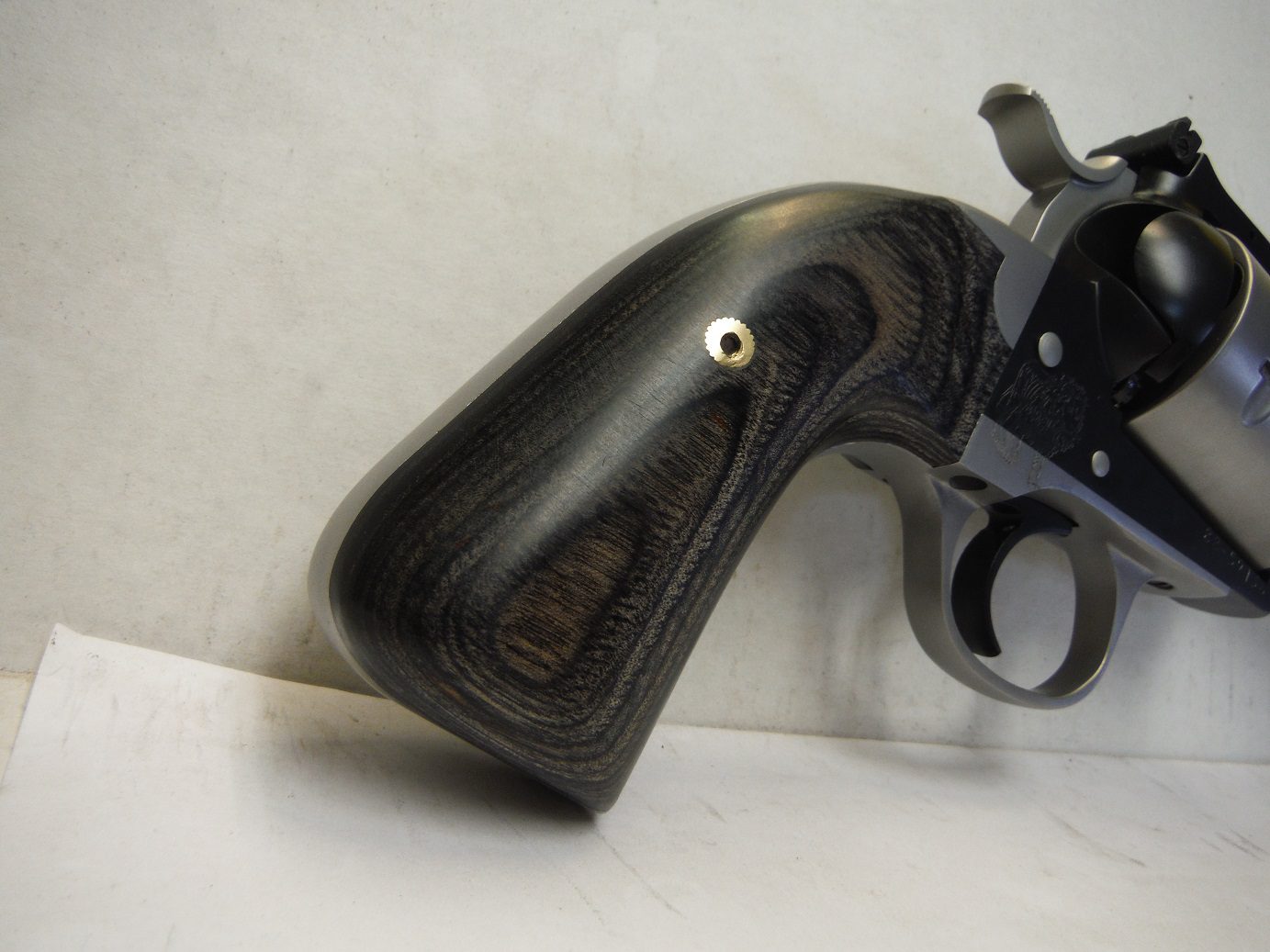 A close up of the side of a gun