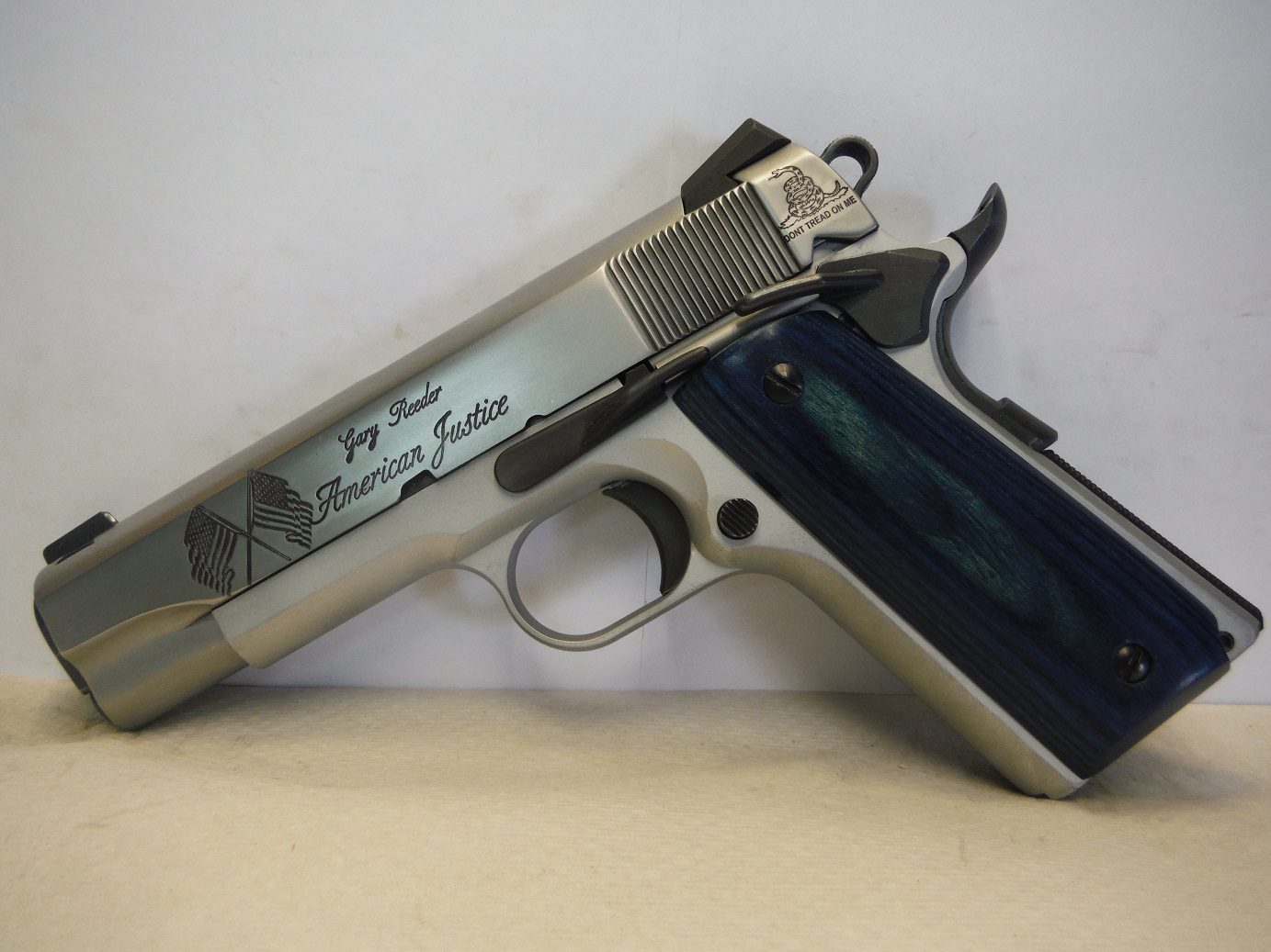 A close up of a gun with the barrel open