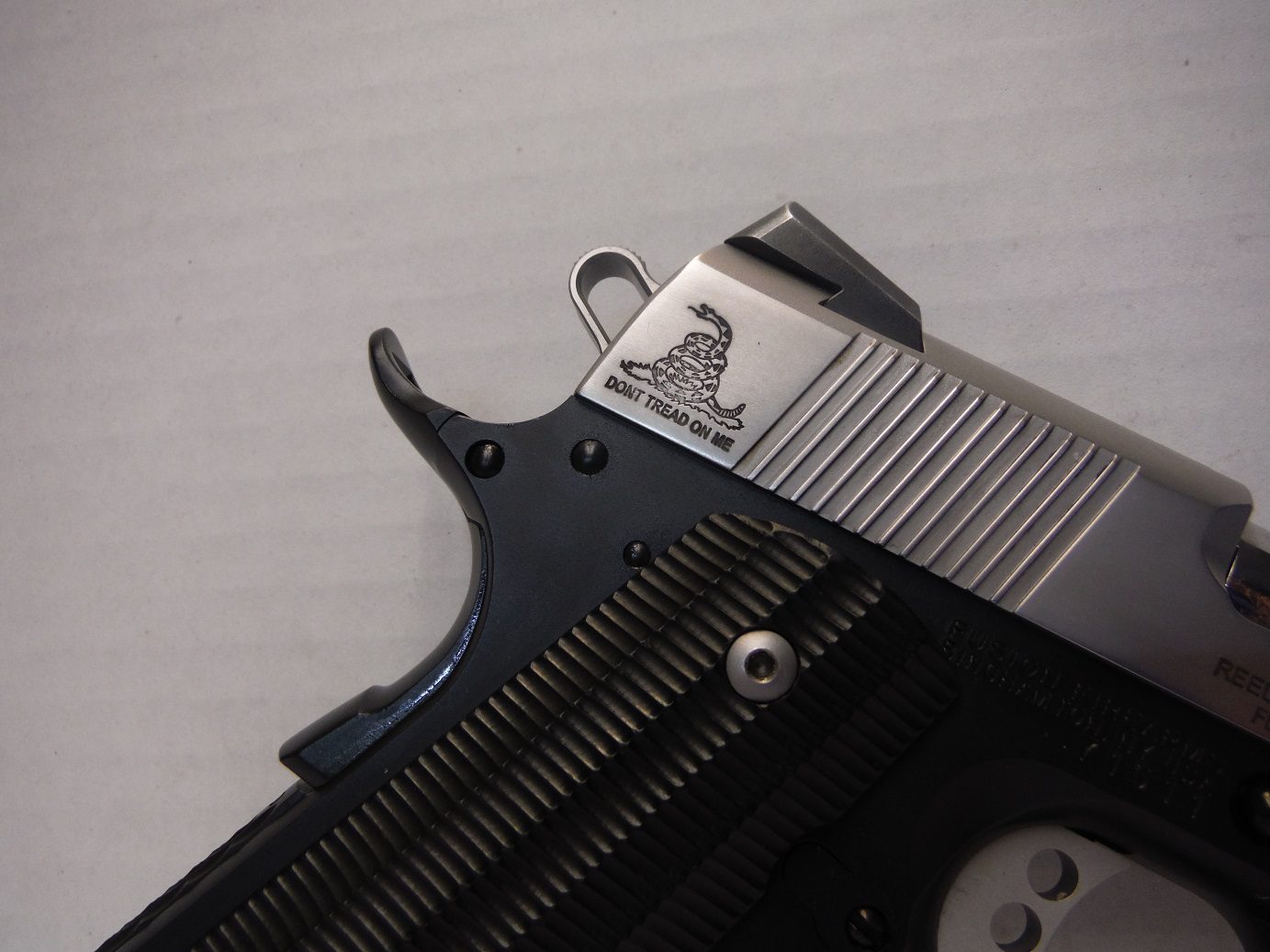 A close up of the top of a gun