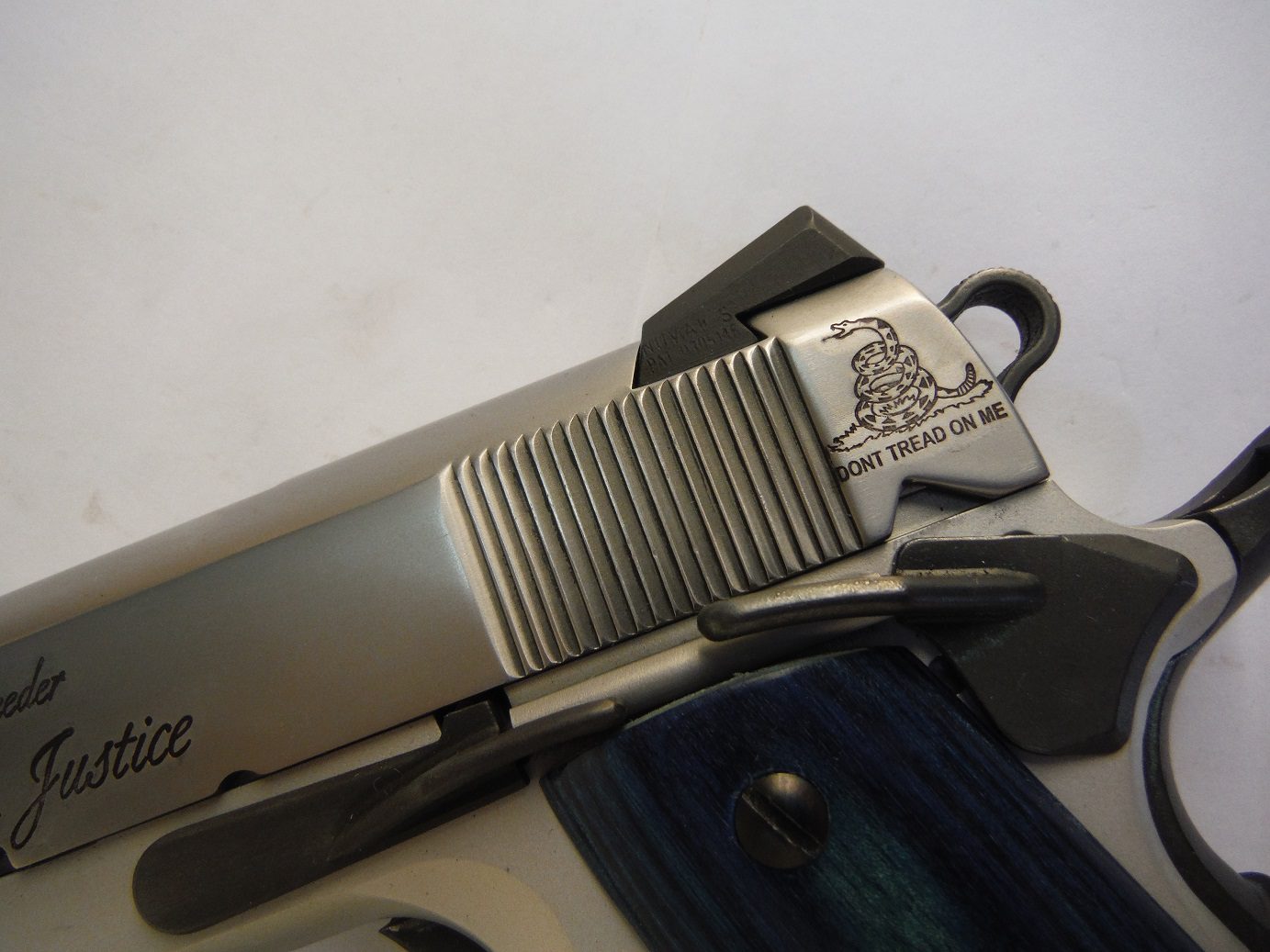 A close up of the top of a gun