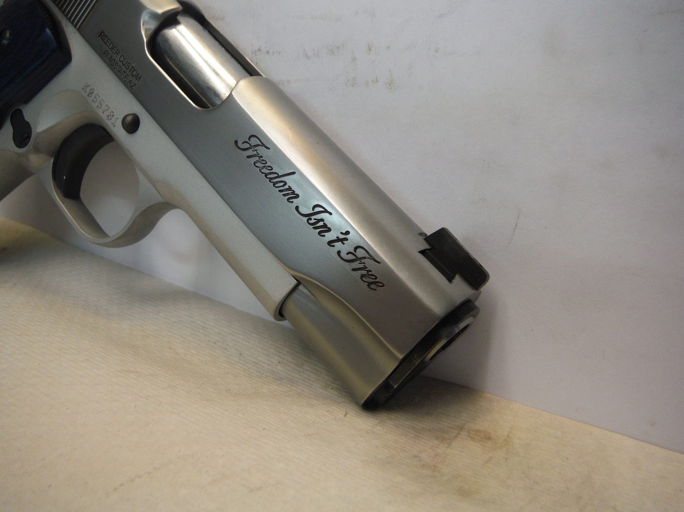 A close up of the side of a gun