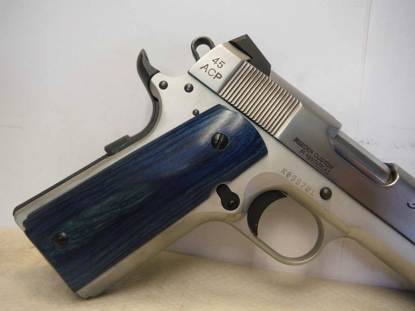 A close up of a gun with the barrel removed