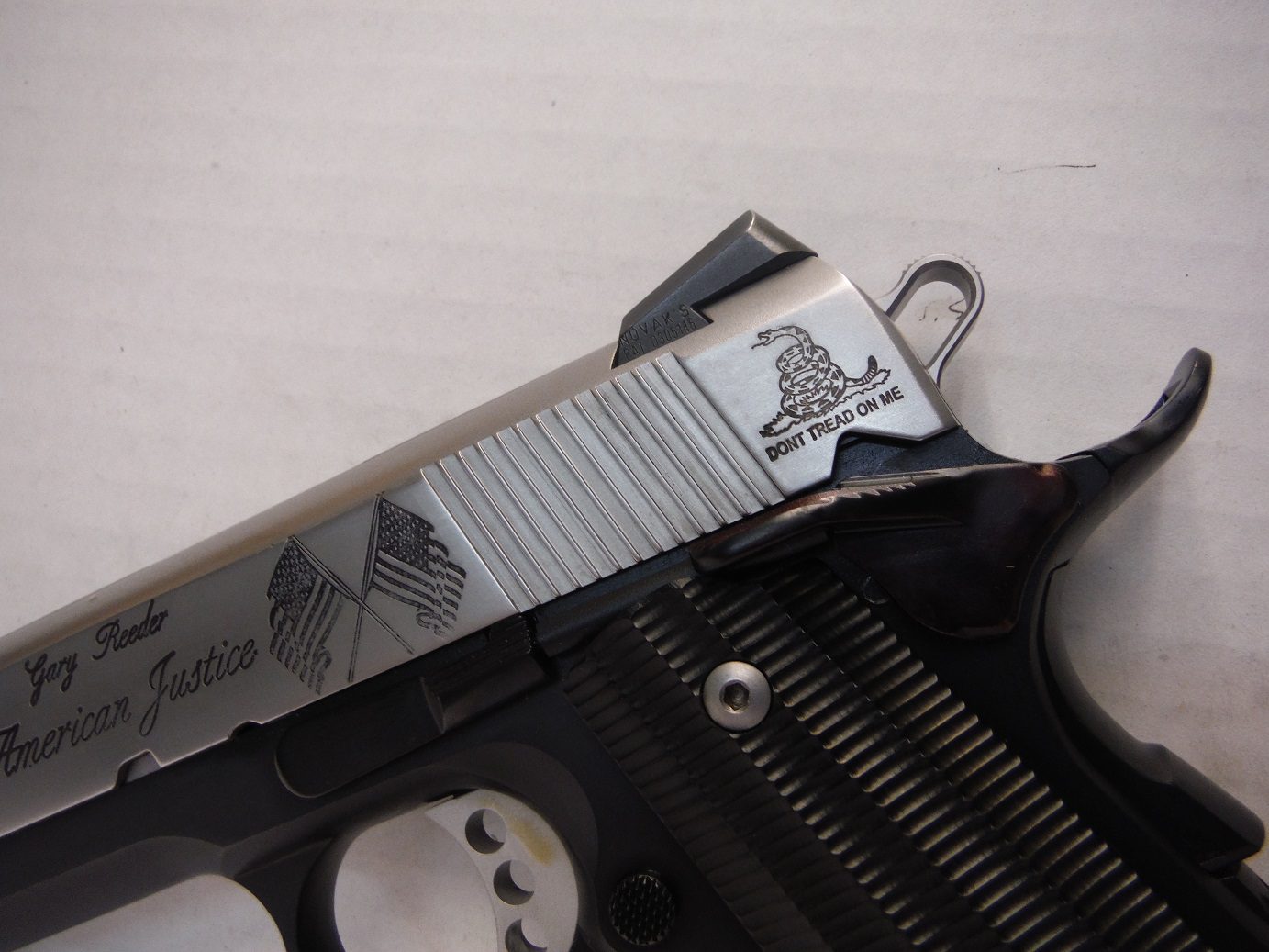 A close up of the top of a gun