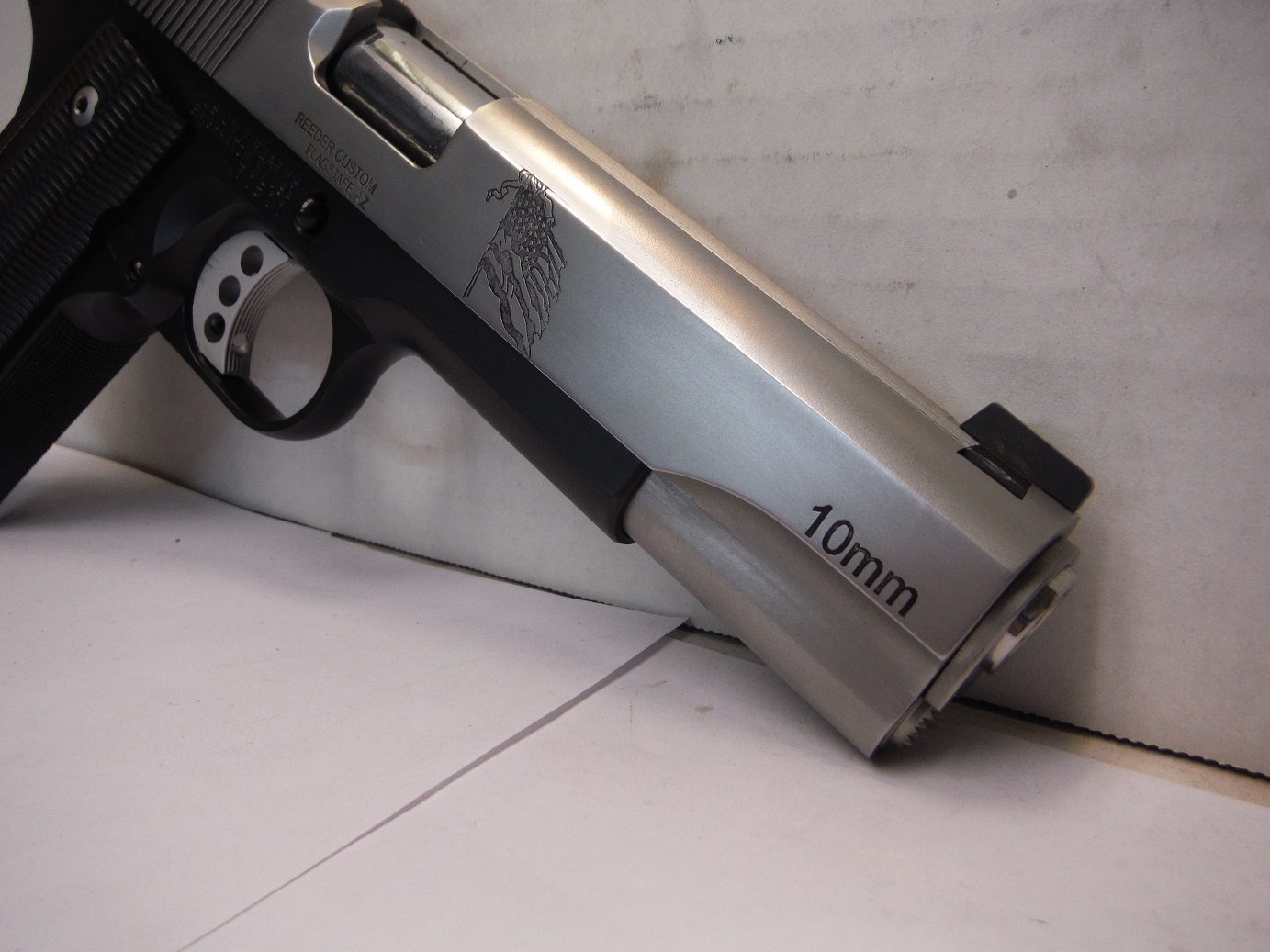 A gun that is sitting on the ground.