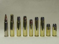 big bore_small A group of different types of bullets lined up.