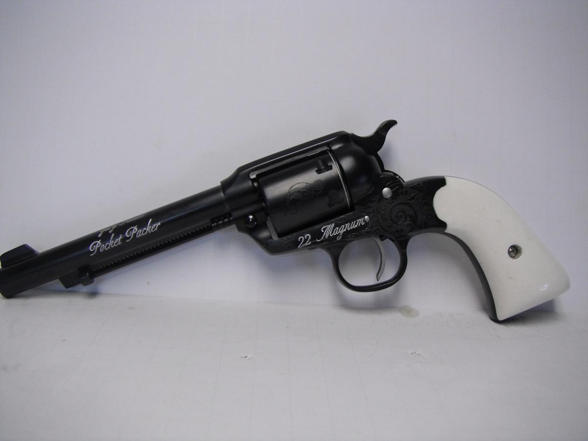 A black and white gun with the words " clyde fitch " on it.