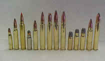 c3_small (1) A group of different types of bullets lined up.