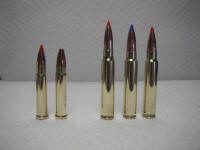 cart-2_small (1) A group of bullets that are sitting on top of a table.