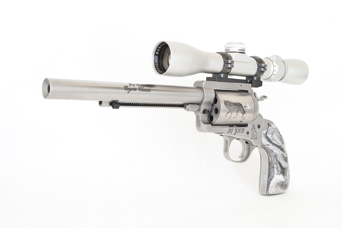 A gun with a scope on it's side.