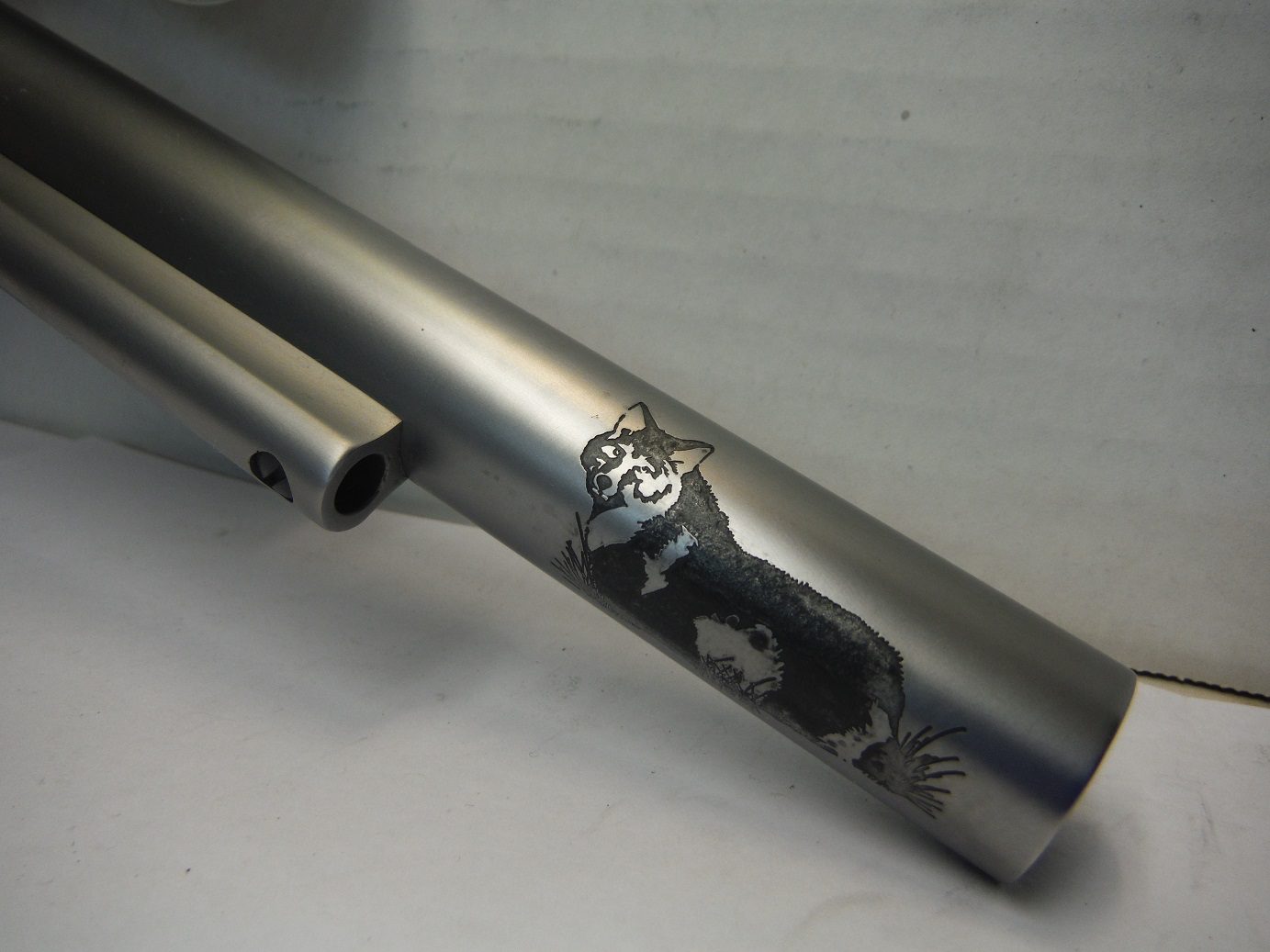 A close up of the barrel on a gun