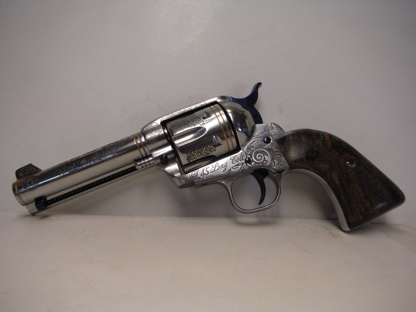 A gun that is sitting on the ground.