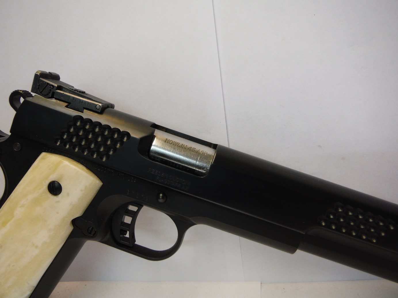 A close up of the barrel on a gun