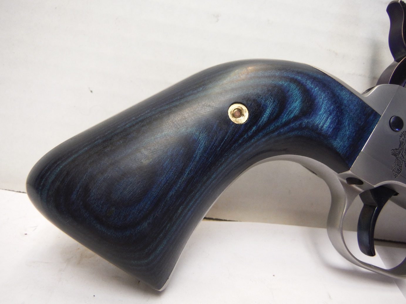 A close up of the side of a gun