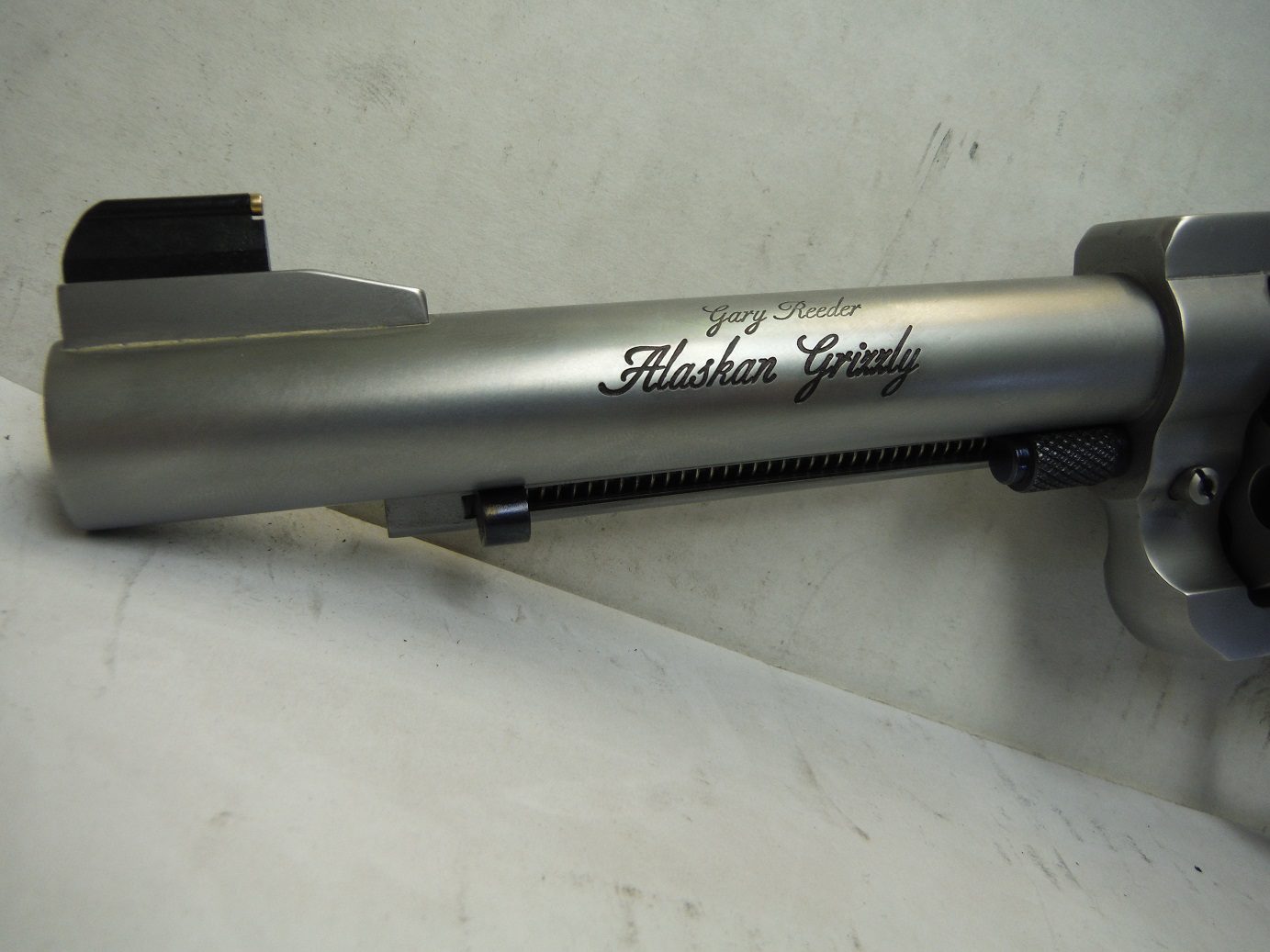 A close up of the side of a gun