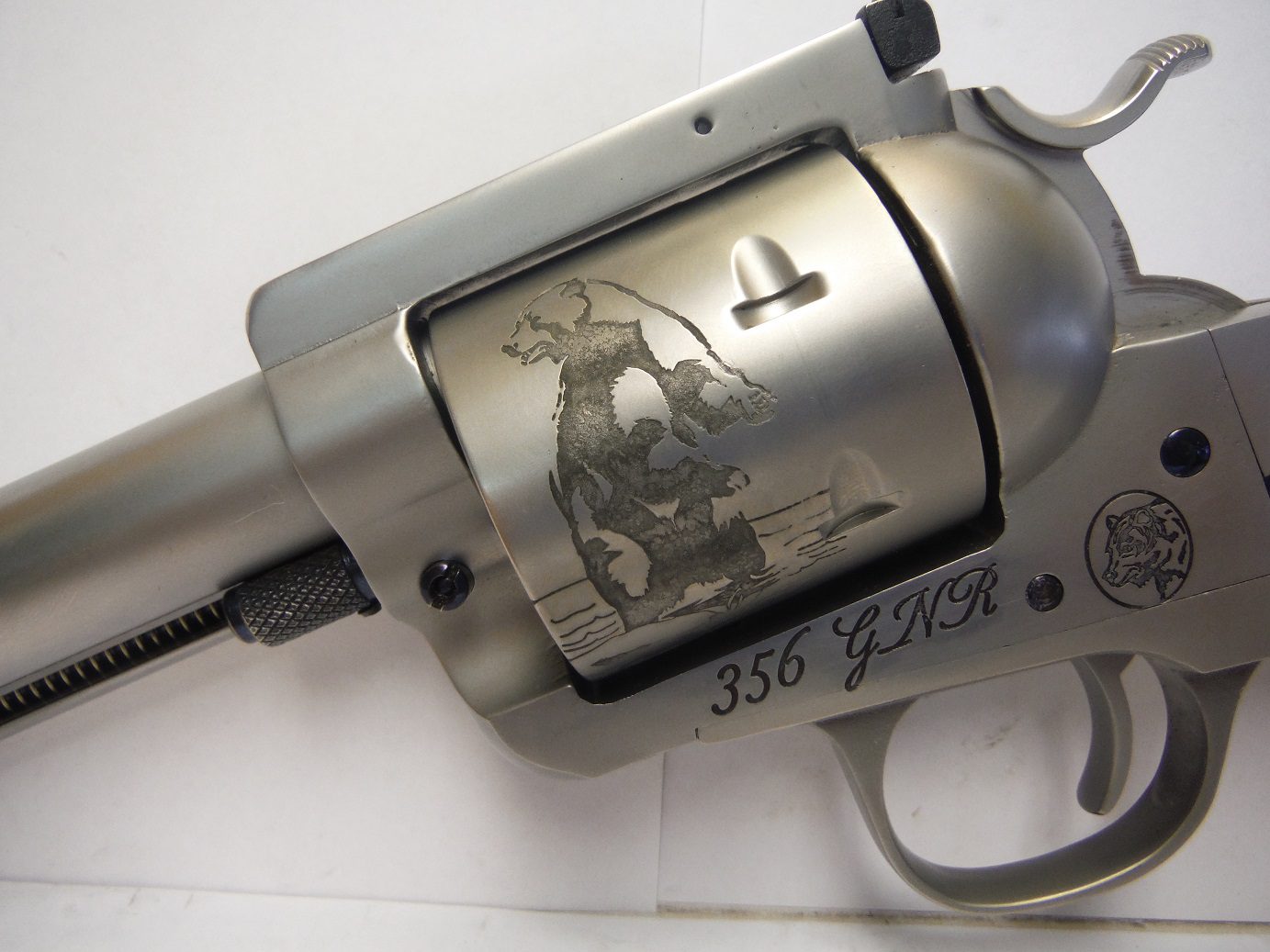 A close up of the side of a gun